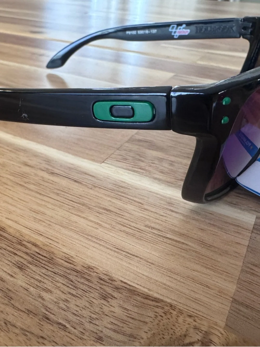 2 Oakley style kids Sunglasses polarized lenses. Not sure if authentic NWT